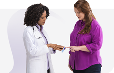 Woman talking to her doctor about Saxenda®